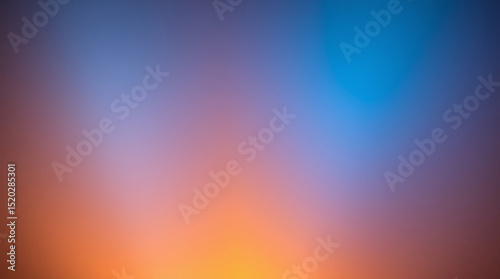 Gradual transition from warm to cool tones in a serene sky at twilight.