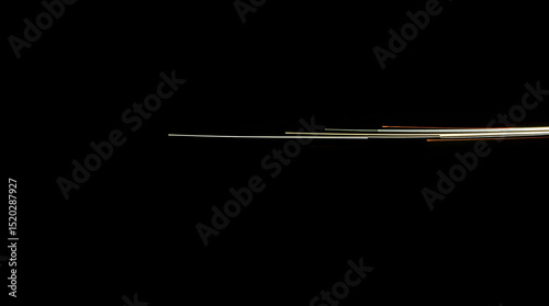 A close-up of fiber optic cables, glowing with light, representing high-speed internet.