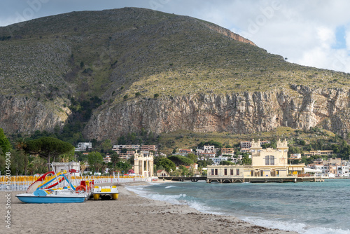 Fototapeta Naklejka Na Ścianę i Meble -  Stormy weather on seaside vacation destination, Mondello Beach, near Palermo in Sicily with fine, golden sand, turquoise waters and charming villas, South of Italy
