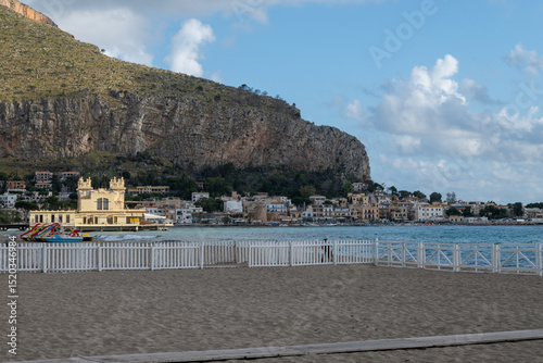 Fototapeta Naklejka Na Ścianę i Meble -  Stormy weather on seaside vacation destination, Mondello Beach, near Palermo in Sicily with fine, golden sand, turquoise waters and charming villas, South of Italy