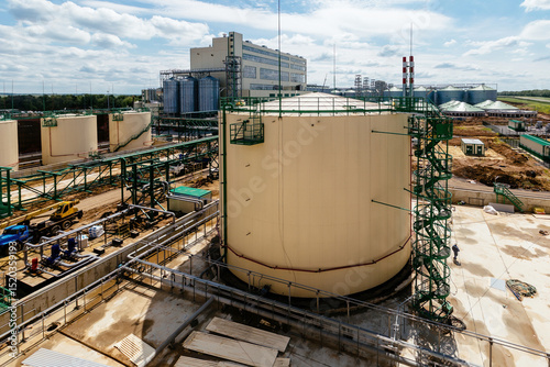 Wallpaper Mural Large industrial round tanks for chemical production or oil. Construction of chemical factory Torontodigital.ca