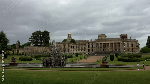 Tourists walking near fountain at Witley Court