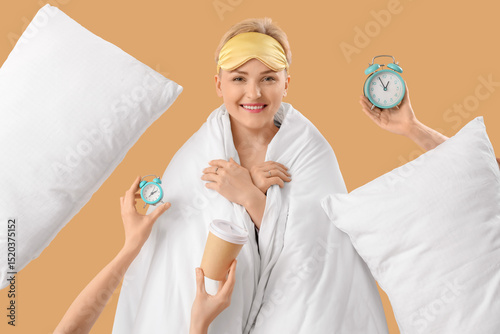 Young woman in blanket and ...