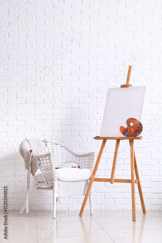 Wooden easel with blank can...
