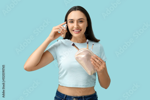 Beautiful young woman with ...