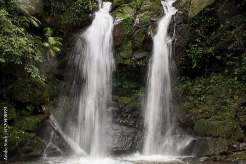 Sapan waterfall nan Thailand. Tranquil Village in the mountain surrounded by dense, vibrant jungle, offering a tranquil retreat.