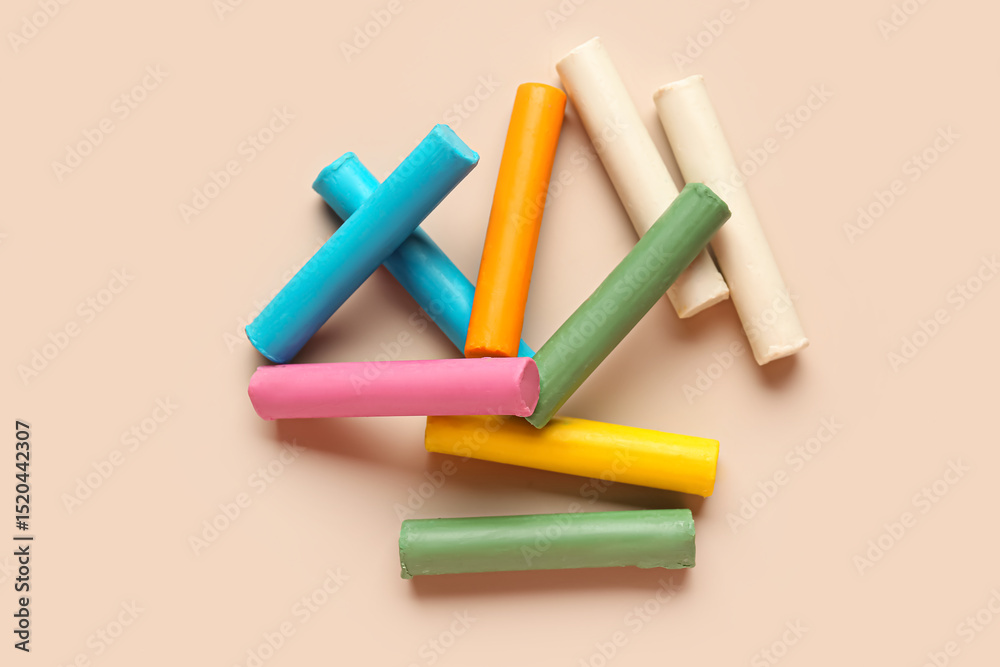 Fototapeta premium Colorful plasticine on beige background