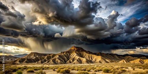 Dark grey clouds with towering silhouettes gathering over the Tabernas Desert in Almeria, Spain, creating an ominous sky with contrasting light and shadows, almeria desert, dramatic clouds