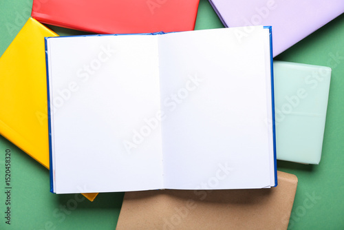 Book with blank pages on gr...