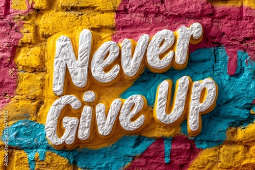 Never Give Up motivational quote painted in bold white letters on a colorful graffiti wall with yellow, pink, and blue hues