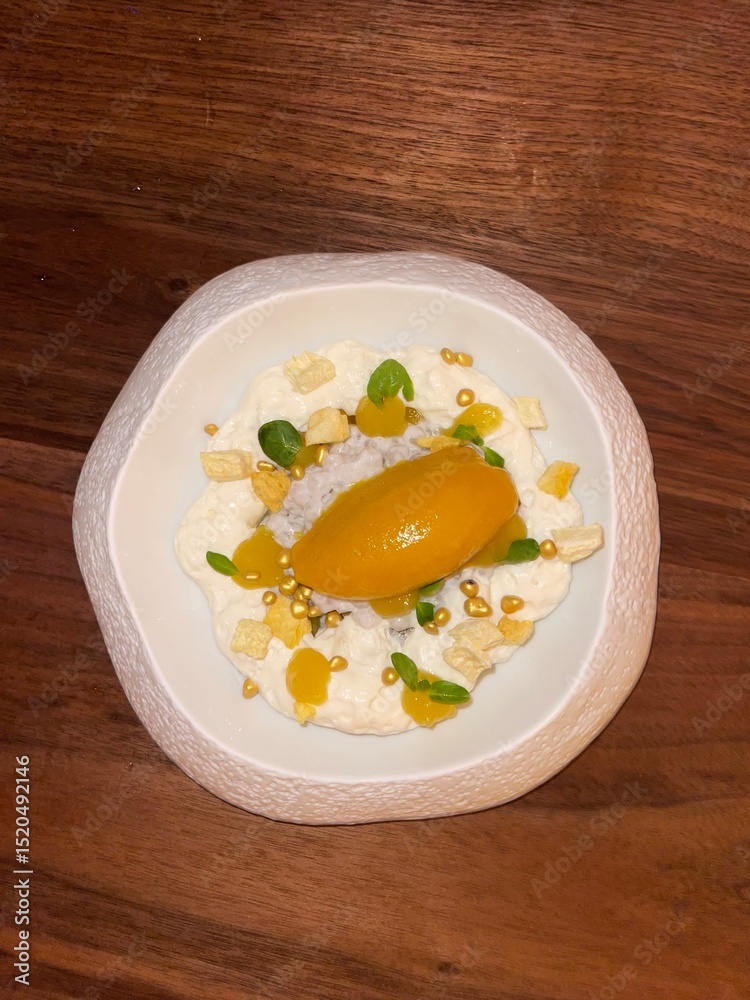sliced mango on top of tapioca pudding dessert sliced mango on top of tapioca pudding dessert