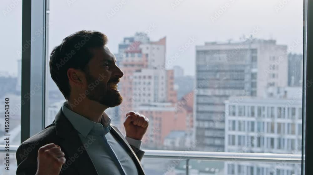Cheerful founder celebrating contract raising arms in cityscape hallway closeup Cheerful founder celebrating contract raising arms in cityscape hallway closeup