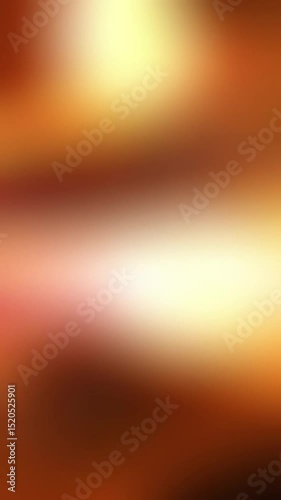 Blurry abstract background in orange, yellow, and white. Perfect for vibrant, energetic designs or compositions needing a soft, dreamy touch.
