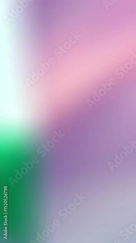 Blurry abstract background of pink green and white colors.