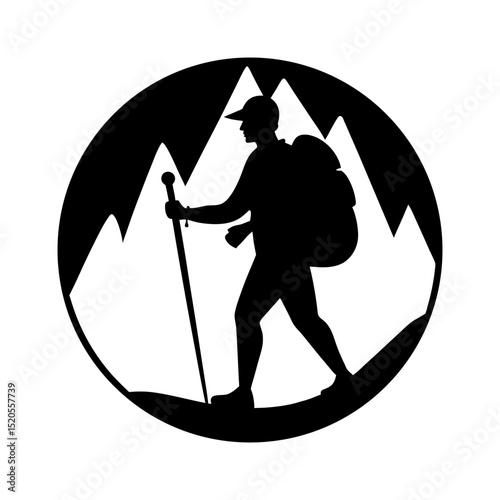 Silhouette of a hiker with backpack and walking stick in mountain scene