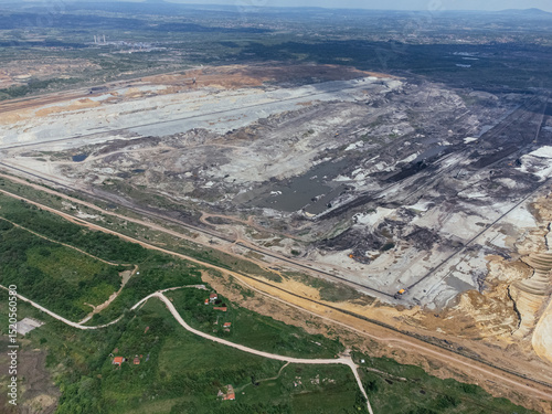 The abandoned, dead city near the Kolubara pit on coal mining by the open way. Drone view Lazarevac, Serbia.