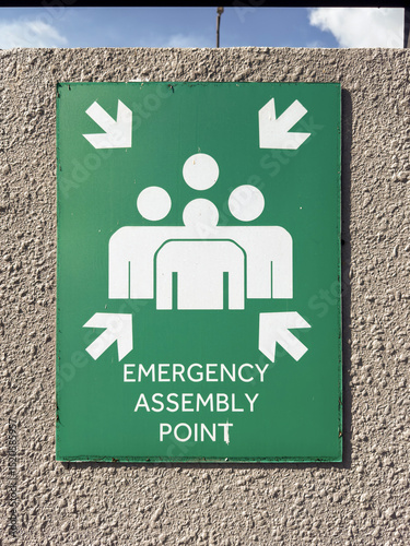 Emergency assembly point sign directs individuals to safe location in Penang, Malaysia