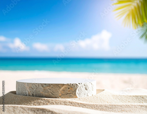 Stone podium for summer cosmetics product presentation on blurred tropical sea sand beach background