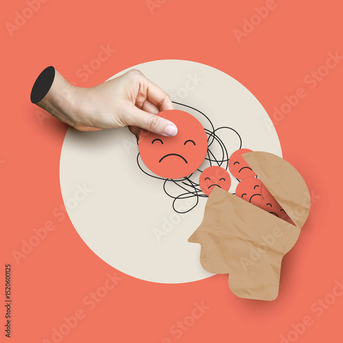 Mental health concept showing a hand removing a sad face from a human head made of paper. Symbolic illustration of emotional struggles, depression, stress, anxiety, and mental wellness support.
