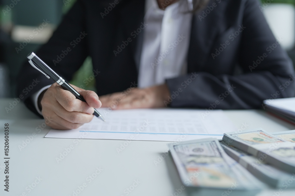 Fototapeta premium Businesswoman Accountant analyzing investment charts Invoice documents. Accounting Bookkeeper Clerk&nbsp;Bank Advisor And Auditor