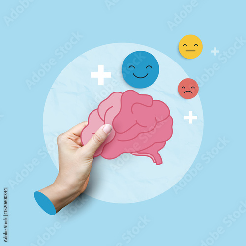 Medical concepts. hand holding brain paper cut with happy, sad, and neutral emoticons representing mental health, emotional balance, psychology, and mood regulation on blue background.