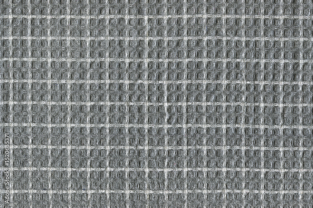 Fototapeta premium Grey White Natural Organic Cotton Large Honeycomb Waffle Weave Towel Fabric Texture Pattern Detail, Large Detailed Horizontal Textured Background Macro Closeup, Creased Textile Swatch