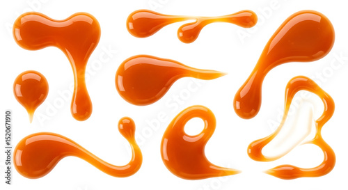 Delicious Caramel Sauce Splatters Isolated on a Black Background Perfect for Dessert Toppings and Sweet Treats Illustrations