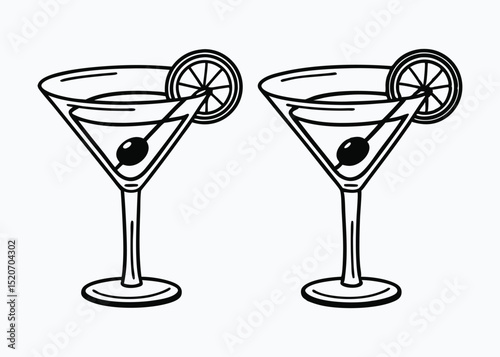 Elegant martini glasses with lemon and olive garnish