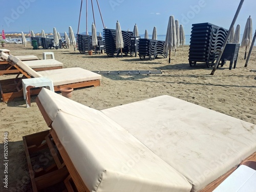 beach chairs and umbrellas photo