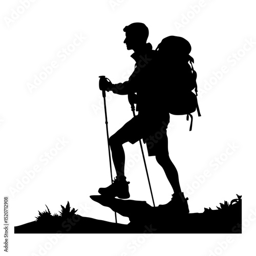 Silhouette of a hiker standing on a mountain top
