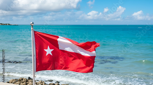 Puerto Rican flag next to the ocean in San Juan photo