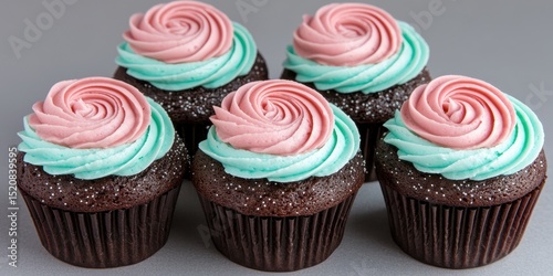 World baking day with chocolate dessert idea. Colorful chocolate cupcakes with swirled frosting on display.