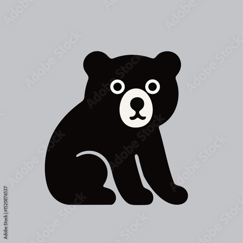 A cute black bear sits with big eyes. Ideal for design or kids art.