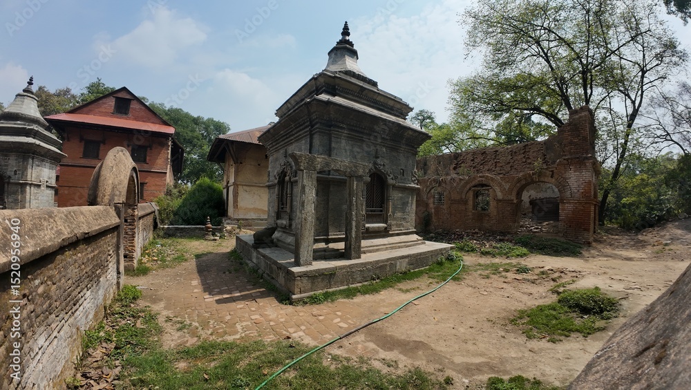 Obraz premium Collection of Votive Stupas and Small Shrines in the Mrigasthali Temple Area, Located in the Hills Above Pashupatinath Temple, Kathmandu, Nepal – Showcasing Rich Architectural Heritage and Spiritual S