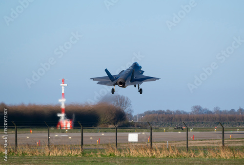 F-35 stealth fighter jet taking off during a NATO exercise at an airfield photo