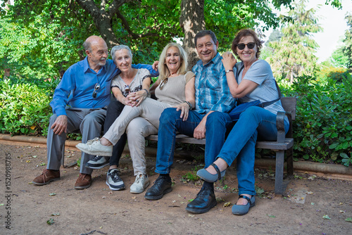 Group of senior friends enjoying time together in park