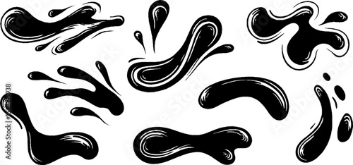Engraved illustration set of artistic splashes and drips for creative design
