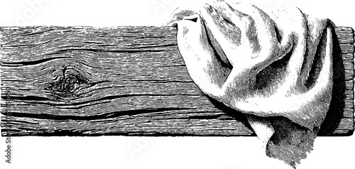 Detailed engraving of weathered wood plank with draped fabric for rustic design
