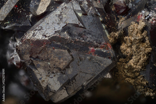 Mineral Cuprite (red copper ore) and silver crystals. Microphotography with high magnification- photo scale 10X
