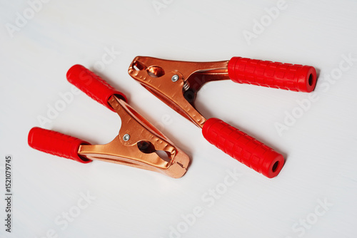 Clamp copper- white background.  Use to connect the cable and the metal case of the equipment- photo clipart