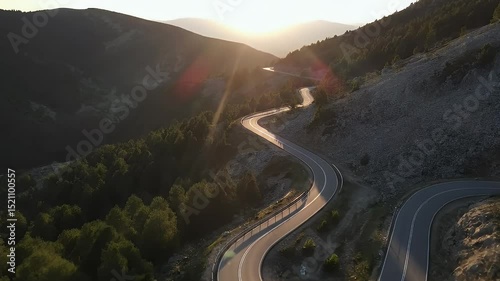 Drone Shot of Winding Mountain Road at Golden Hour – No Cars or People