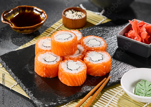 Philadelphia luxe salmon roll with cream cheese, vibrant lighting, minimalist composition