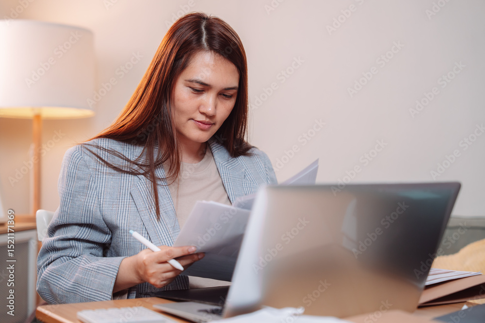 Fototapeta premium Businesswoman Planning Document Financial Report Investment Management Marketing Desk Office, Analyzing Charts and Reports While Strategizing for Business Growth and Profitability