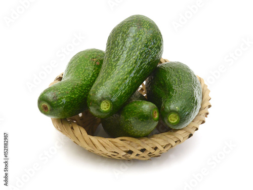 There was a plate of fresh avocado on a white background