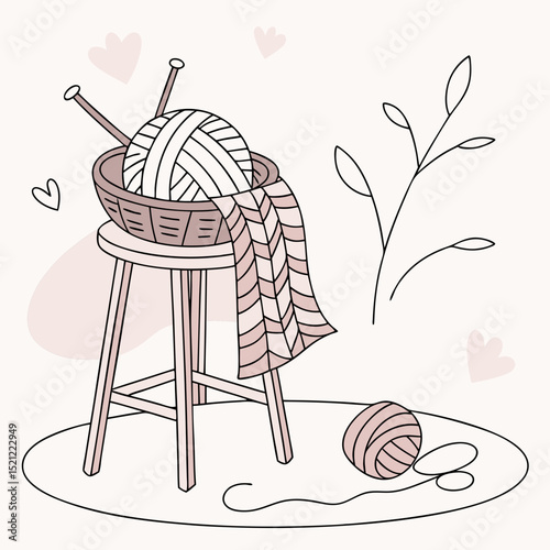 Cozy armchair with tea and cup on tray featuring a blanket  