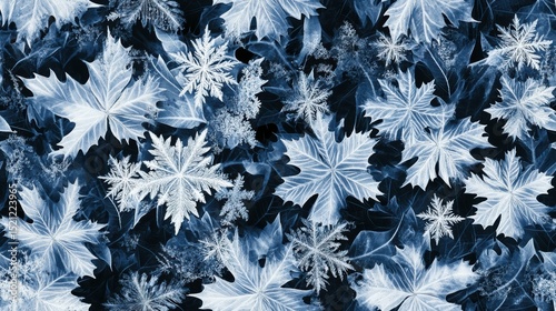 A repeating pattern of delicate snowflakes integrated with cold, frosted leaves, creating a seamless winter design