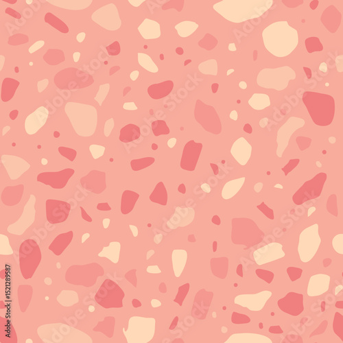 Abstract terrazzo pattern in soft pink and cream tones, featuring irregular shapes of varying sizes scattered across the background.