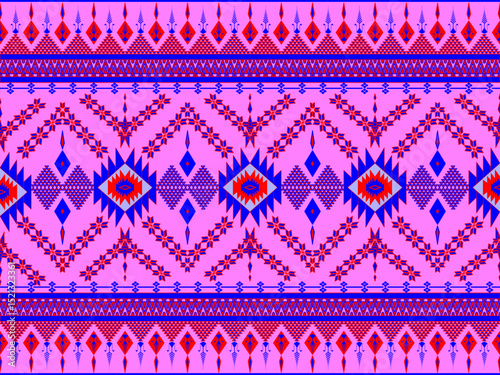 This fabric features a pink and purple native print with intricate geometric and zigzag motifs, suitable for textile and fashion designs seeking a striking and vibrant look.