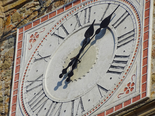 A large old clock located on the Stephen Tower in Baia Mare city, Romania