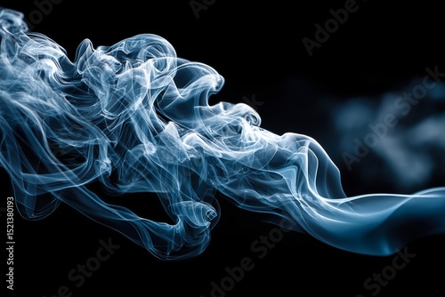 Abstract smoke swirls on a dark background with dramatic lighting.